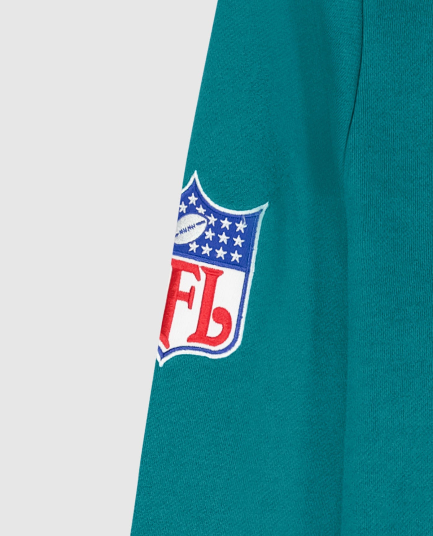 Detail View of Starter Aqua Miami Dolphins Crew Neck Sweatshirt With Zip Pockets | STR MIAMI DOLPHINS AQUA