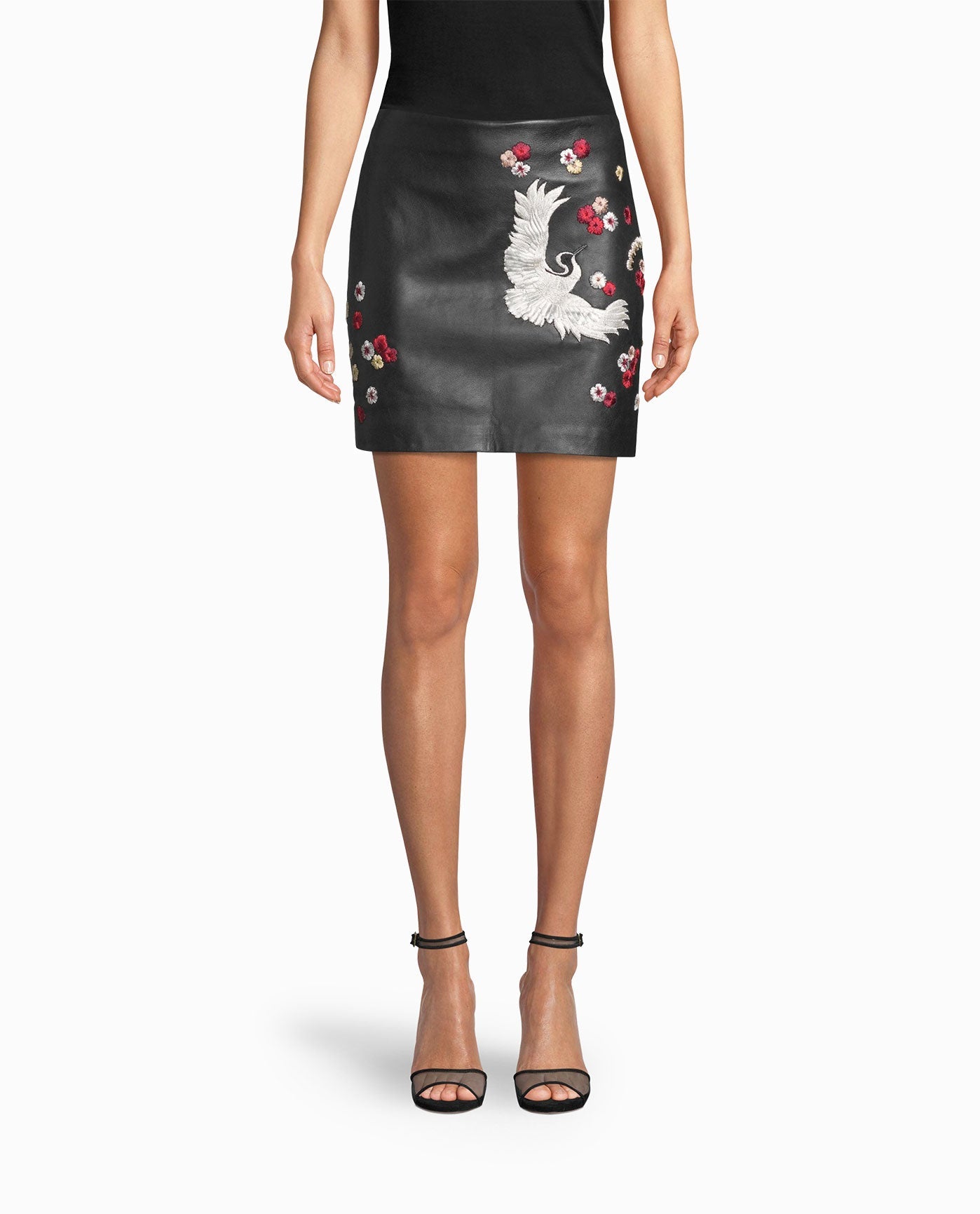 Front View Of Nicole Miller Crane And Cherry Blossom Leather Mini Skirt | NM BLACK EMBELLISHED CHERRY BLOSSOM