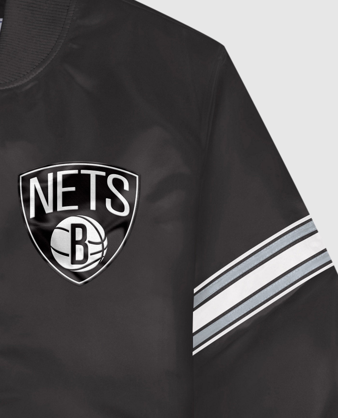 Detail View of Starter Black Brooklyn Nets Satin Full-Snap Starter Jacket | STR BROOKLYN NETS BLACK