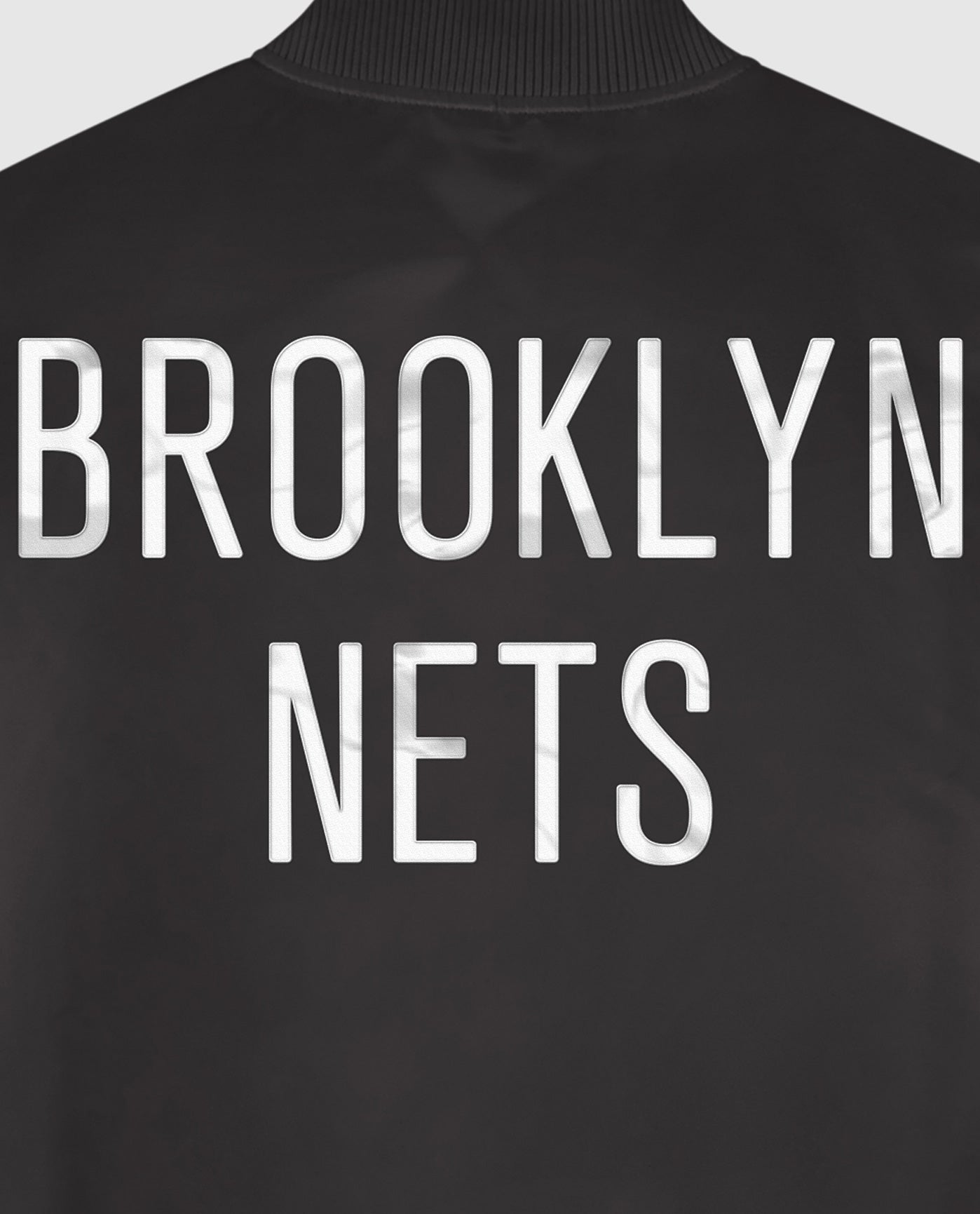 Detail View of Starter Black Brooklyn Nets Satin Full-Snap Starter Jacket | STR BROOKLYN NETS BLACK