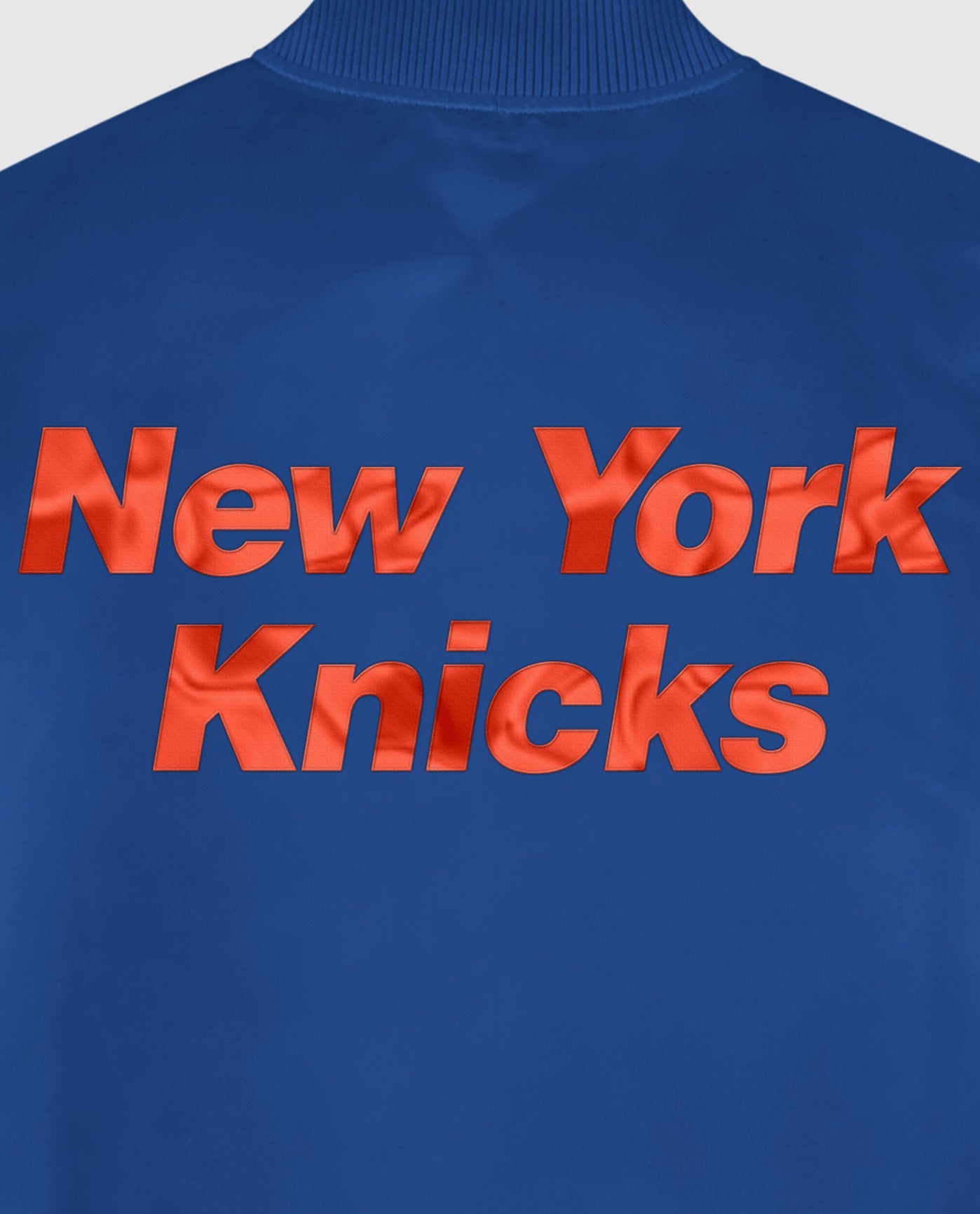 Detail View of Starter Blue New York Knicks Satin Full-Snap Starter Jacket | STR NEW YORK KNICKS BLUE