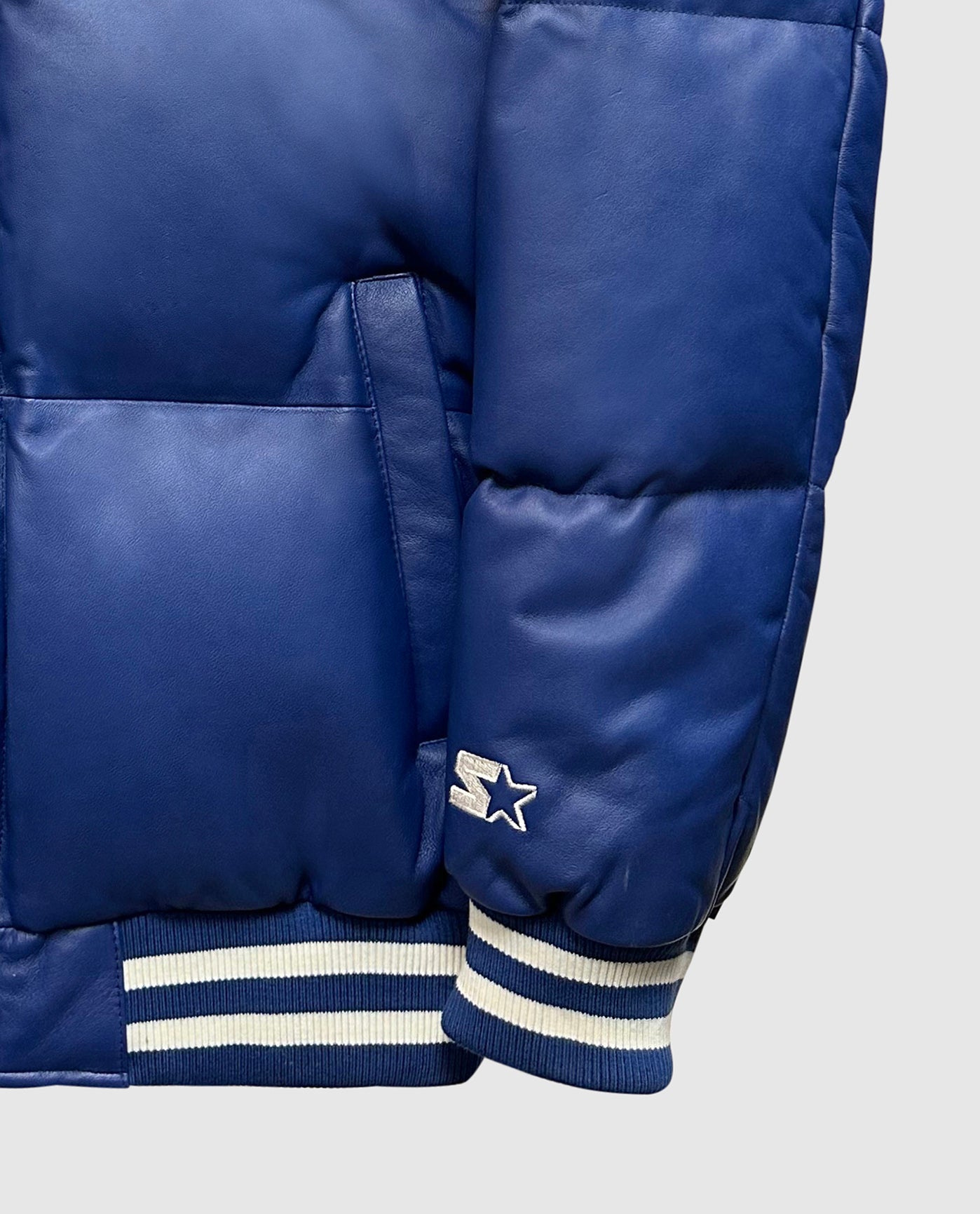 Detail View of Starter Blue New York Giants Bronx Bubble Starter Leather Puffer Jacket | STR NEW YORK GIANTS BLUE