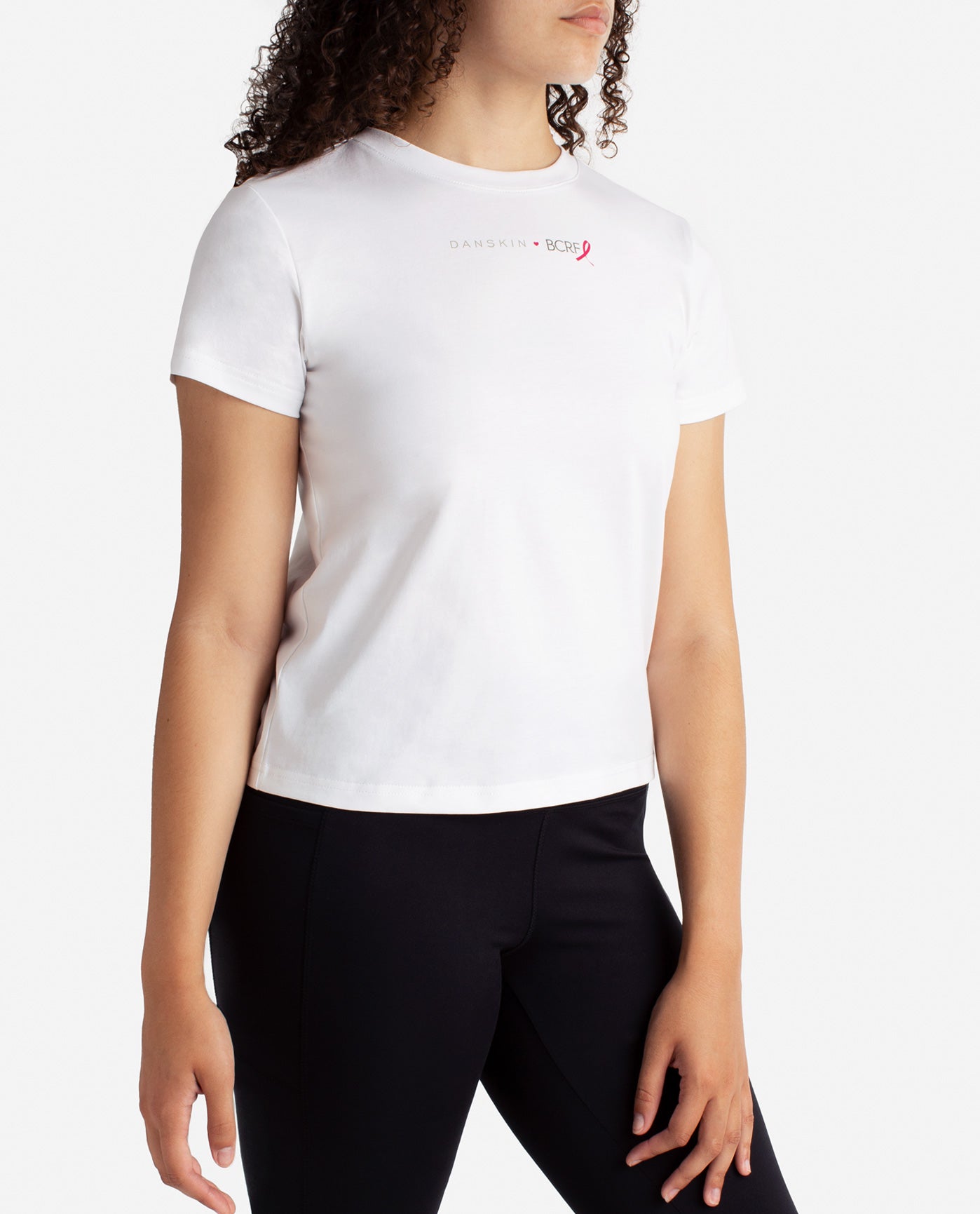 Side View Of Danskin White Danskin X Bcrf Tee | DSK WHITE