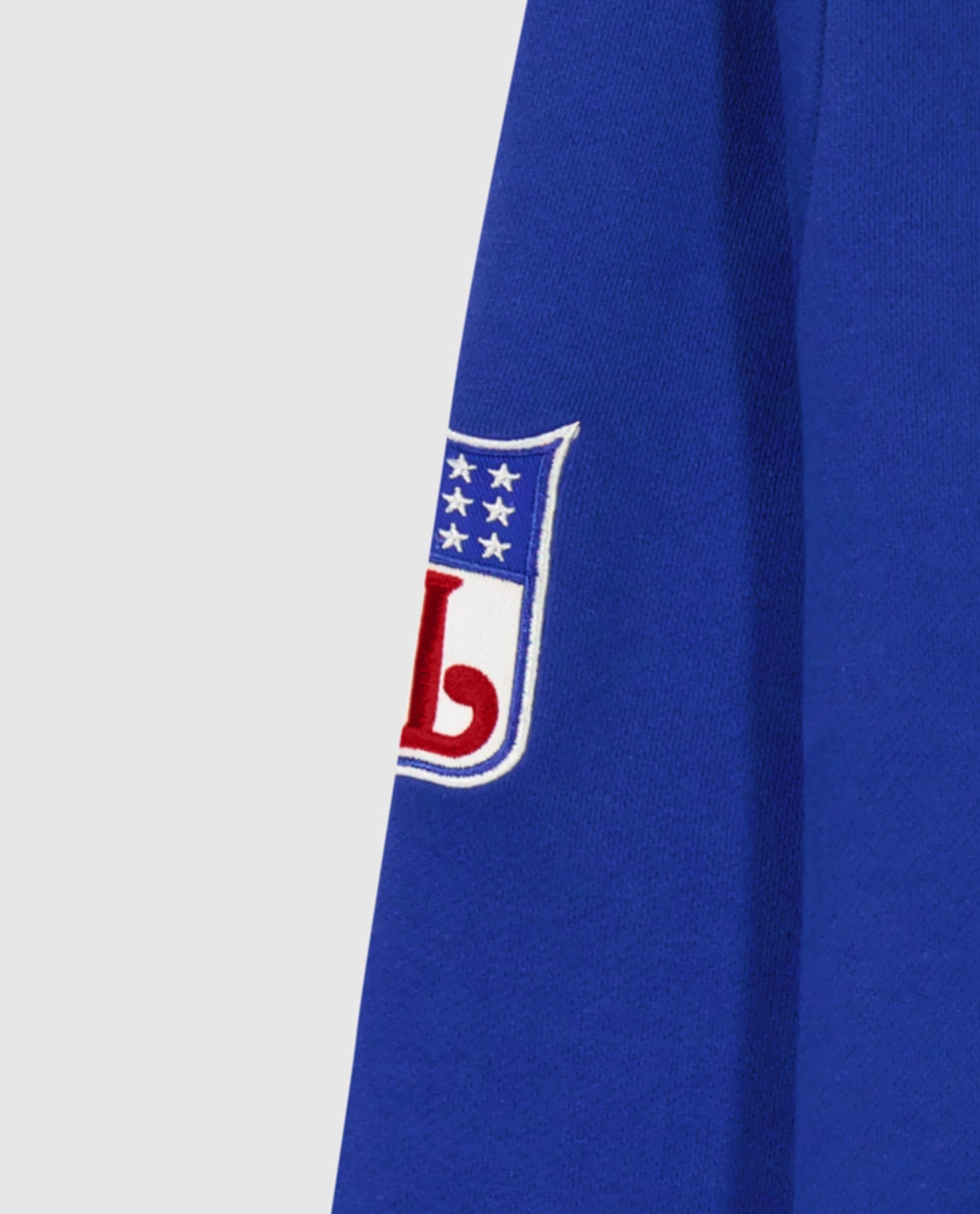 Detail View of Starter Blue New England Patriots Crew Neck Sweatshirt With Zip Pockets | STR NEW ENGLAND PATRIOTS BLUE