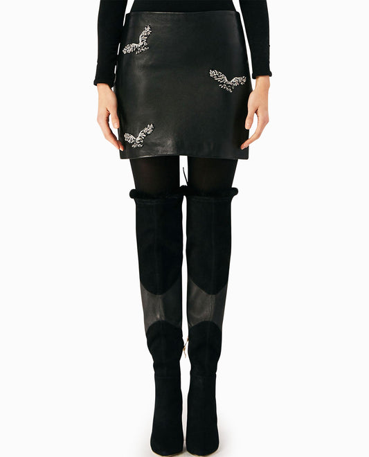 Front View Of Nicole Miller Embellished Eagle Leather Mini Skirt | NM BLACK EMBELLISHED EAGLE