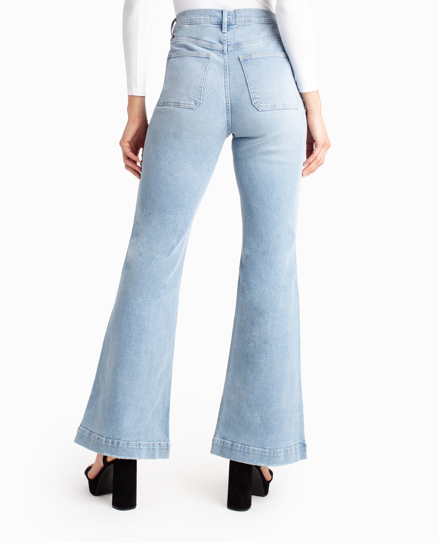 Back View Of Nicole Miller Sutton Place High Rise Flare Jean | NM LIGHT BLUE