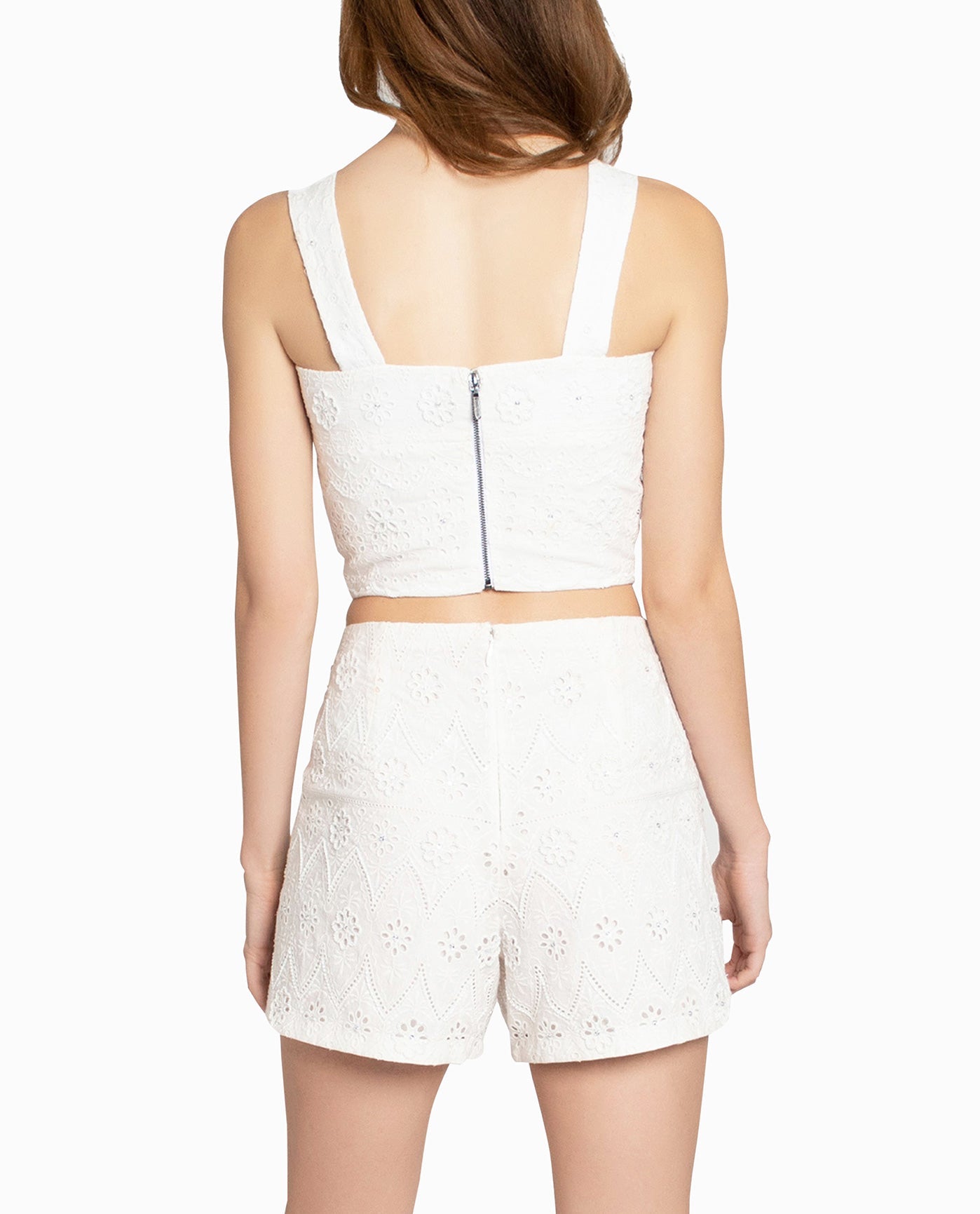 Back View Of Nicole Miller Embellished Eyelet Crop Top | NM WHITE