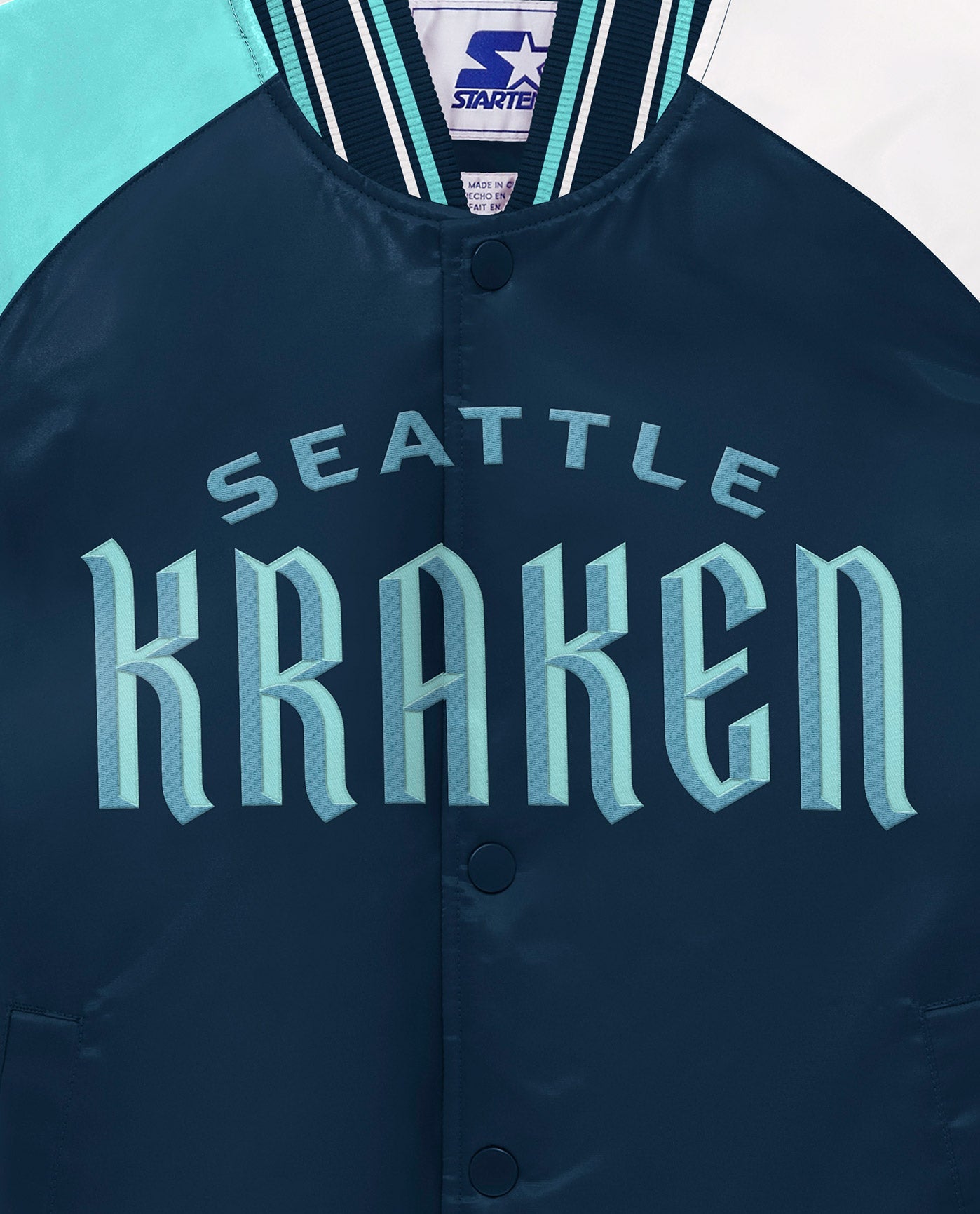 Side View of Starter Navy Youth Seattle Kraken Varsity Satin Full-Snap Starter Jacket | STR SEATTLE KRAKEN NAVY