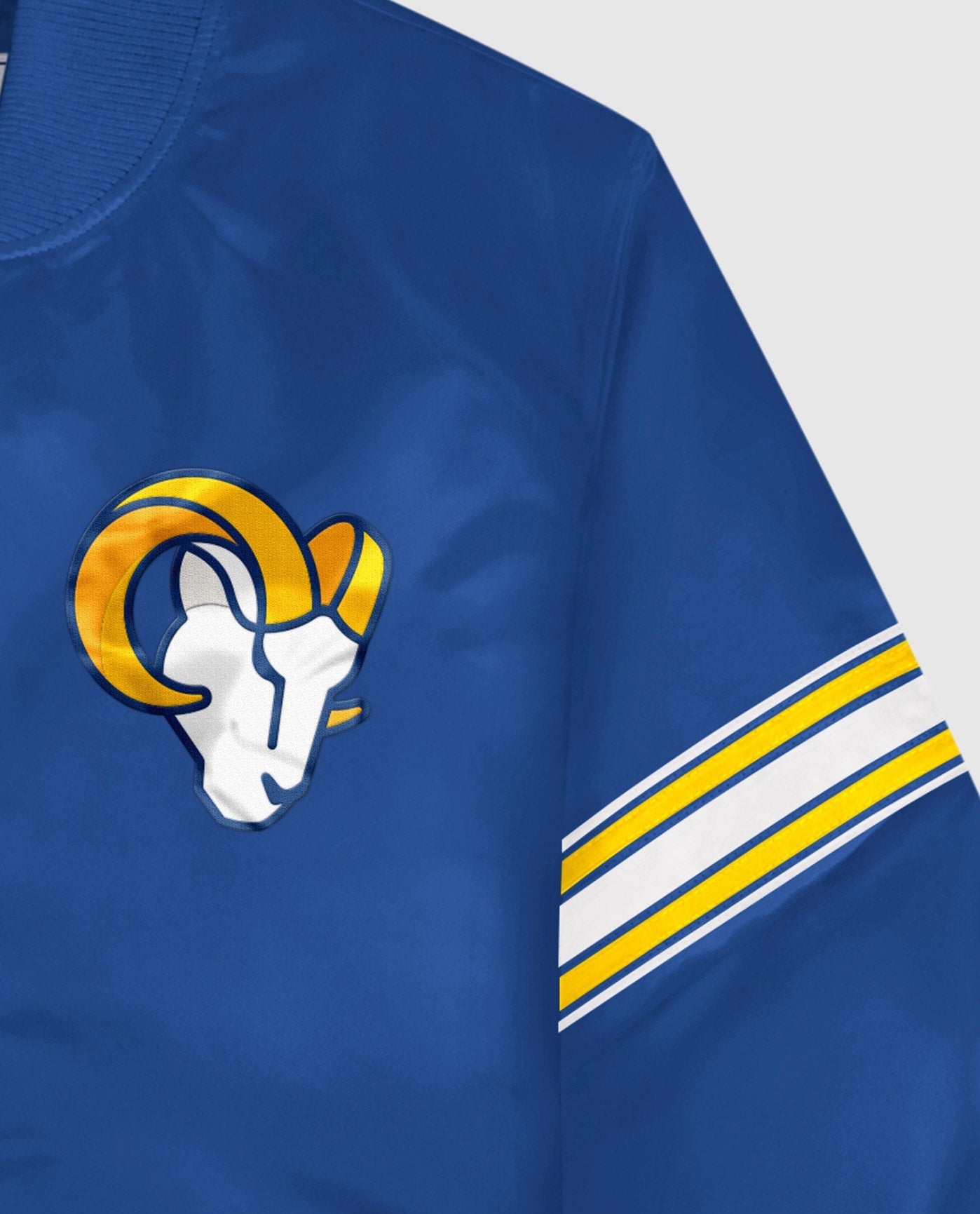 Side View of Starter Blue Los Angeles Rams Satin Full-Snap Starter Jacket | STR LOS ANGELES RAMS BLUE