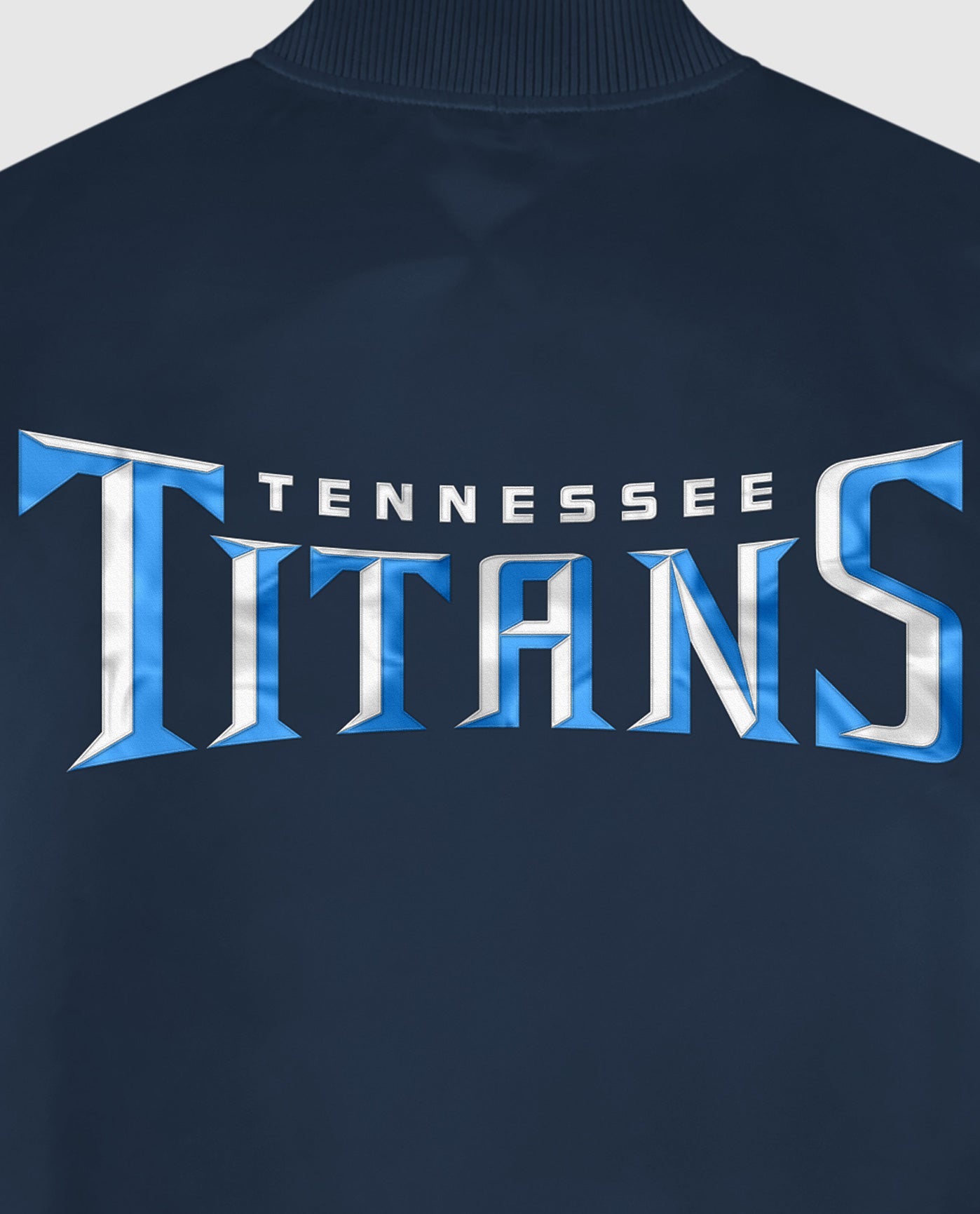 Detail View of Starter Navy Tennessee Titans Satin Full-Snap Starter Jacket | STR TENNESSEE TITANS NAVY