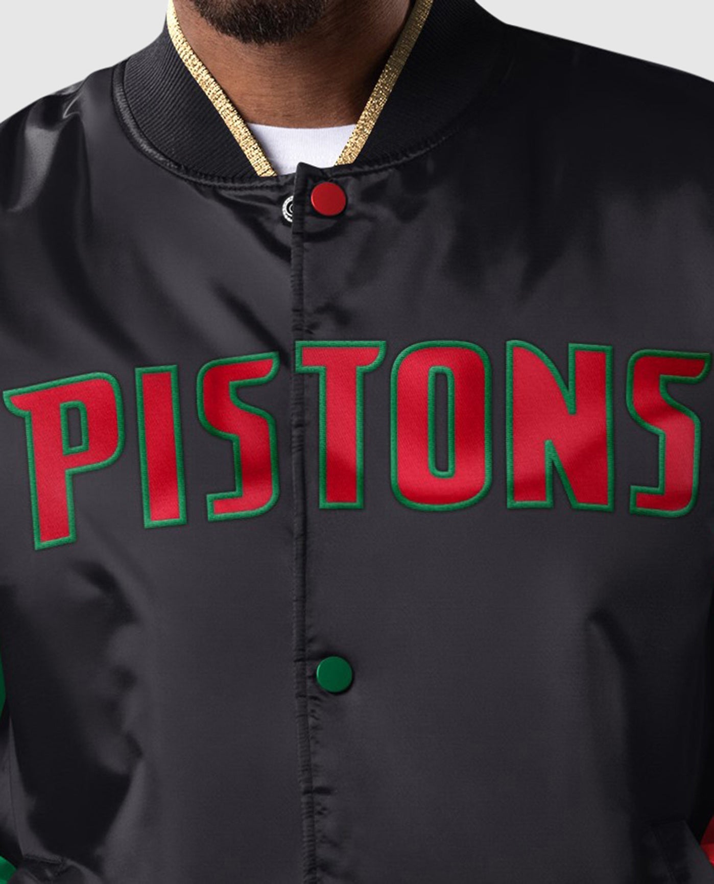 Detail View of Starter Black Detroit Pistons Black History Month Quilted Lining Starter Satin Full-Snap Jacket | STR DETROIT PISTONS BLACK