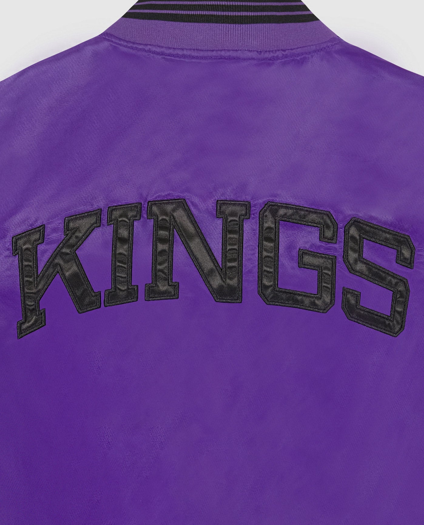 Detail View of Starter Purple Womens Sacramento Kings Varsity Satin Full-Snap Starter Jacket | STR SACRAMENTO KINGS PURPLE